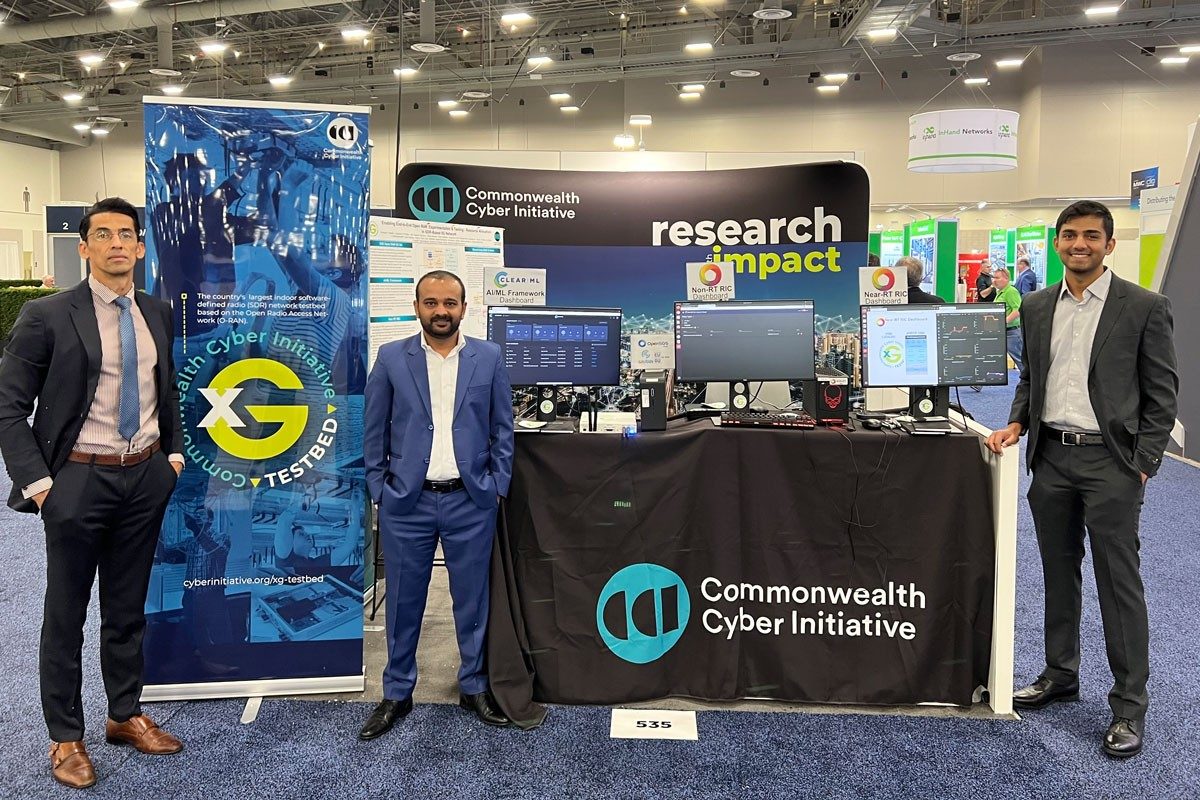 CCI team at booth at Mobile World Congress